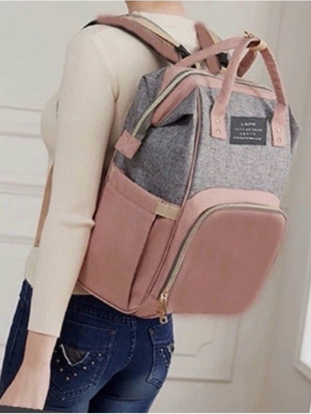 Gray and Pink Women’s Backpack with Gold Hardware